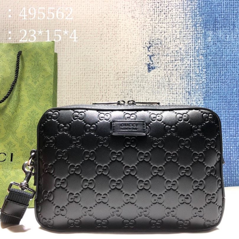 G*u*i clutch bags